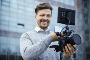 Professional videographer with a modern camera rig